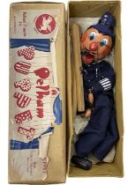 A boxed Pelham SM Policeman marionette puppet