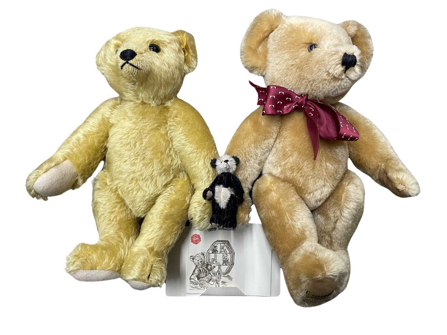 A trio of collector's Teddy bears, to include: - Steiff, tag number 000508, with growler -