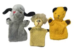 A trio of vintage television toy puppets, to include: - Chad Valley Sooty - Patsy B Sweep (with