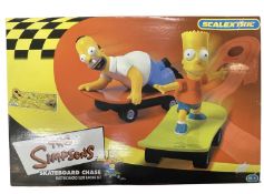 A boxed Scalextric set: The Simpsons Skateboard Chase