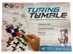 A boxed Turing Tumble marble-powered computer building kit.