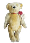A Steiff 1909 replica teddy bear. Tag number 0165/51 Height approximately: 50cm