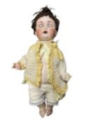 A large Schutzmeister and Quendt bisque head toddler doll, with blue weighted eyes, open mouthed