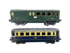 A pair of Hornby 0 gauge tin plate French rail cars/carriages, to include: - Paris - Lyon