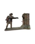 A reproduction J E Stevens cast iron mechanical money bank, modelled after William Tell shooting