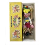 A boxed 1962 Pelham Puppets Pinocchio.