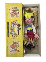 A boxed 1962 Pelham Puppets Pinocchio.