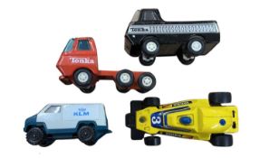 A mixed lot of various pressed steel and plastic Tonka Toys, to include: - KLM van - Red Truck Cab -