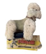 A vintage VIA Rock Toys battery powered 'Princess' poodle, with part box.