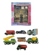 A mixed lot of tinplate, plastic and die-cast vehicles, to include: - Clockwork fire engine with