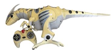 A remote-controlled Roboraptor and controller, by Wowwee
