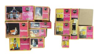 A collection of vintage boxed Sindy lounge and kitchen accessories, to include: - Dining Table and