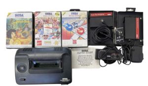 A Sega Master System II with controller, leads and various game cartridges