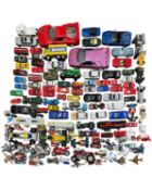 A large collection of various die-cast vehicles, to include: - Corgi - Matchbox - Transformers -