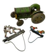 A mixed lot of tinplate toys, to include: - Mettoy tractor in playworn condition. - A pair of (