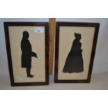 Pair of silhouette portrait pictures of a lady and gent