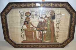 An Egyptian papyrus picture set in an octagonal frame