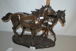 Modern bronze effect model of two horses