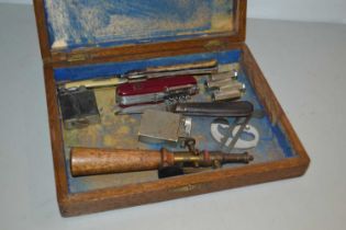 Small wooden box containing pocket knives and other items