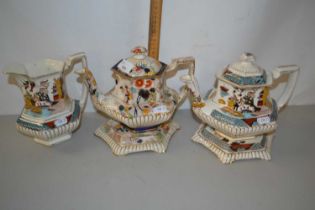 Two Victorian teapots and stands plus a further similar jug