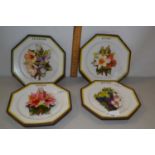 Set of four Cadodimonte floral encrusted plates