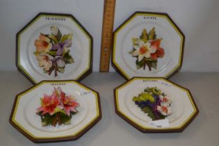 Set of four Cadodimonte floral encrusted plates