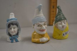 Three Royal Worcester candle snuffers, Mr & Mrs Caudle and Mr Punch (3)