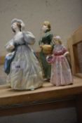 Four Royal Doulton figures to include Grand Manor, Hilary, Grace and another