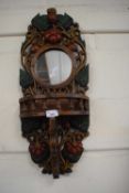 Carved wooden wall mirror and shelf