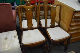 Set of four dining chairs with drop in seats