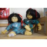 Pair of Oriental dolls
