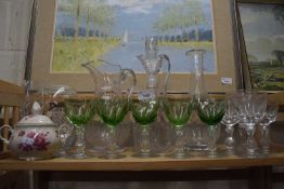 Collection of various glass decanters, wine glasses and other items