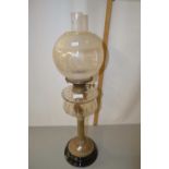 Oil lamp with clear glass font