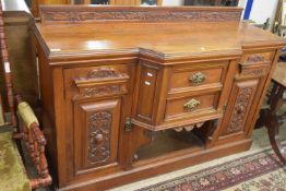Late Victorian American walnut sideboard with carved decoration