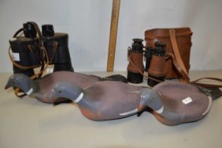 Two pairs of vintage binoculars together with three rubber decoy pigeons