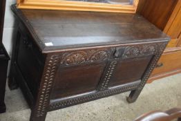 18th Century oak coffer with carved two panel front
