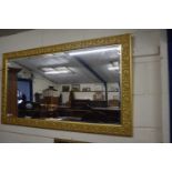 Large rectangular bevelled mirror in a gilt effect frame