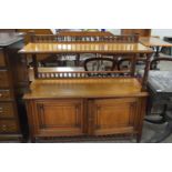 Late Victorian buffet side cabinet with shelf over a base with two panelled doors, 102cm wide