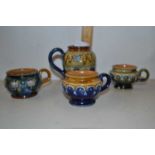 Four various small Doulton condiment pots