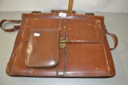 Leather satchel together with a gents travelling vanity set