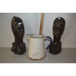 Pair of African wooden figures and an enamel jug