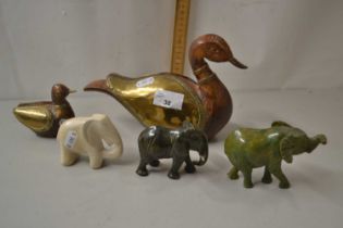 Mixed Lot: Polished stone elephants, brass mounted wooden duck etc