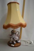 Pottery table lamp with cow shaped base
