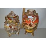 Two early 20th Century Japanese three footed vases