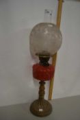 Oil lamp with red glass font