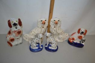 Group of various small Staffordshire model dogs