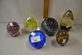 Group of six various paperweights