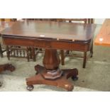 19th Century mahogany fold top card table on shaped column and platform base