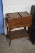 Finnigans, London a mahogany tambour top sewing cabinet with subdivided interior and two secret