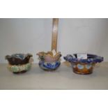 Four small Doulton vases with frilled rims